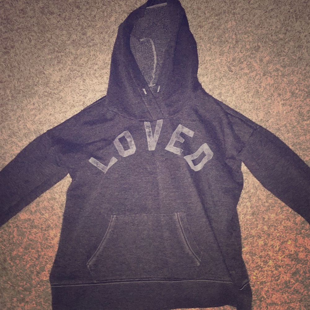 This is a sweat shirt on it says : L O V E